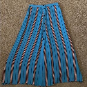 High waisted midi length skirt with pockets!